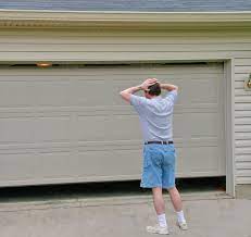 why is my garage door opening by itself garage doors garage door maintenance garage door problems