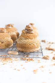 Choux Au Craquelin Cream Puffs With Caramelised White Chocolate Whipping Ganache Caramelised Bananas And Pecan Brittle Recipe Food And Drinks Whipped