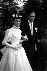 The Stories Behind The Most Iconic Wedding Dresses In History Weddings History Audrey Hepburn Wedding Audrey Hepburn Wedding Dress Celebrity Wedding Photos