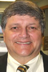 Veteran Hawkins hired to coach Madison basketball