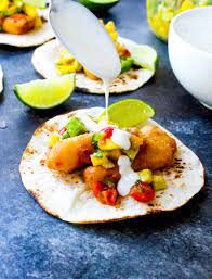 Avocado mango salsa for fish tacos. Beer Battered Fish Tacos With Mango Avocado Salsa Spicy Ranch Drizzle