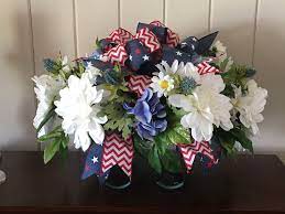 I must have flowers, always, and always. claude monet flowers are those little colorful beacons of the sun from which we get sunshine when dark, somber skies blanket our thoughts. dodinsky he who is born with a silver spoon in his mouth is generally considered a fortunate person. Red White And Blue Cemetery Saddle Headstones Decorations Cemetery Decorations Cemetery Flowers