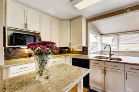 black appliances. kitchen island
