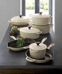 Le Creuset Signature 7 25 Qt Round Cream Dutch Oven With Lid Reviews Crate And Barrel Le Creuset Cookware Kitchen Cookware Kitchen Items