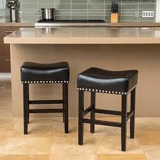 Barstools and counter stools offer a comfortable seating option for kitchen counter areas, pub tables, and dining rooms. Buy Loring Black Bonded Leather Backless 26 Inch Counter Stool Set Of 2 By Gdfstudio On Dot Bo