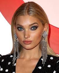 She played professional basketball before pursuing a modeling career. Elsa Hosk Flaunts Sexy Legs In Crystal Embellished Anja Velvet Pumps