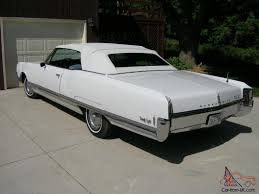 1965 oldsmobile 98 convertible white with white top 78 500 2 owner miles 1965 oldsmobile 98 convertible white