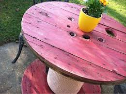 Large Wooden Spool Used As A Table Left As Is For Garden Display As A Potting Bench Or To Rest Your Large Wooden Spools Wooden Spool Tables Spool Furniture