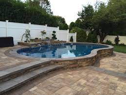 19 Best Stone Patio Ideas And Designs To Enhance Your Home S Exterior Interior Design Pro Backyard Pool Landscaping Pool Patio Small Backyard Pools