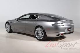 Image result for Titanium Silver 2011 Aston Martin