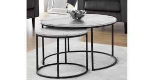 This coffee table rests on thick silver metal legs. Bellini Round Nesting Coffee Table Marble The Place For Homes