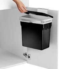 A Door Mounted Garbage Can Free Up Floor Space While Leaving Plenty Of Room For Storage Under Simplehuman Kitchen Trash Cans Inside Kitchen Cabinets