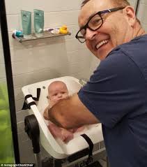 A couples baby shower can be fun and rewarding. Charlichair Shower Chair Designed To Help Parents Bathe Their Babies And Even Kim Kardashian And Kanye West Have One Daily Mail Online