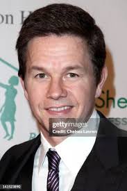 Father Colm O'Ryan and Actor Mark Wahlberg attend The Good Shepherd... News  Photo