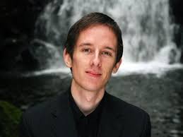 Late Carrickfergus musician's posthumous PhD received by his parents