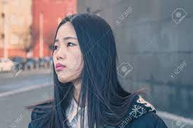 Great news!!!you're in the right place for asian girl long hair. Young Beautiful Chinese Girl With Long Hair Posing In The City Streets Stock Photo Picture And Royalty Free Image Image 35715393