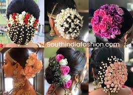 indian wedding bun hairstyle with flowers and gajra wedding bun hairstyles indian bun hairstyles bridal hair decorations