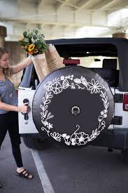 Maybe you would like to learn more about one of these? Floral Jl Jeep Tire Cover With Backup Camera Floral Wreath Etsy Jeep Tire Cover Tire Cover Floral Wreath Design