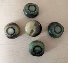 Saw this at a sale yesterday. Figured I'd share it here. I bet someone in  here has seen these buttons before.