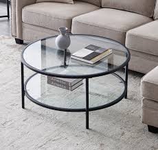 Generally the rule is that your coffee table should be the same height as your couch's seat (give or take one to two inches, but not any lower). Latitude Run Cherin Coffee Table With Storage Wayfair