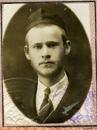 The passport photo of Yizhak Zvi Ettinger, from his passport that was  issued during the period of the British Mandate, in which he is described  as the owner of a book store