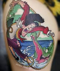 Pin By Megan Feenstra On Disney Tattoo Ideas Peter Pan Tattoo Disney Tattoos Hook Tattoos