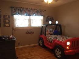 Yes it's definitely cheap for all the features it has but it does lack in quality so be mindful of that. Little Tikes Jeep Wrangler Toddler To Twin Convertible Bed Red Walmart Com Walmart Com