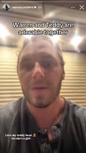 Warren Zeiders Singing to His Dog