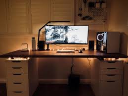 I hacked together a 98 inch wide custom ikea desk that looks awesome. Warm Desk Setup Superdesk