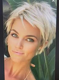 Searching for the most striking layered pixie cuts for your next hairdo?  Our website have a compilation of 26 images! This layered pixie cut for  brown hair is one of them.