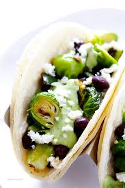Saute the corn and jalapeño with some salt, olive oil, and lime juice. Brussels Sprouts Tacos With Creamy Avocado Sauce Gimme Some Oven