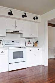 Base molding adds a unique detail at the foot of your cabinets similar to the floor molding that's common in many homes. Rachel Schultz Building Out The Toe Kicks On Kitchen Cabinets