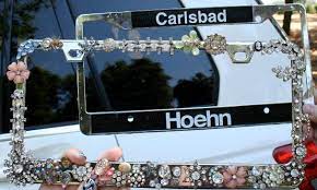 I like how you creatively improvised the crayon bit to attach the diy rhinestones. 8 Diy License Plate Frame Ideas License Plate Frames License Plate Plate Frames