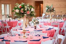 Navy blue brings modesty to your wedding day. Monica Winton S Elegant Navy Coral Wedding Coral Wedding Decorations Coral Wedding Centerpieces Navy Wedding Decorations