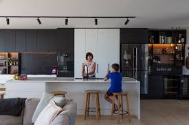 Bar stools are a place for coffee, breakfasts, and even the odd vino. A Perfectly Bespoke Tauranga Family Home Stuff Co Nz