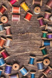 Prime and then paint your new spool holder in the colour of your choice. Retro Wooden Sewing Spools With Colourful Threads Over Vintage Stock Photo Picture And Royalty Free Image Image 56668651