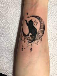 Black cat sitting on moon playing with star decal is perfect for halloween as well as everyday cat lovers (such as myself). Cute Cat Tattoos Cute Tattoo Ideas Cat Tattoo Designs Cat Tattoo Small Cute Cat Tattoo