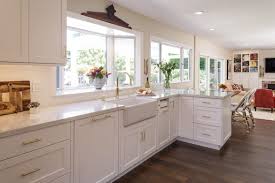 Today i'm going to share with you all the details and sources, decisions and changes we made to our dark, drab and dated kitchen. White Kitchen Remodel With Polished Brass Accents Msk Design Build