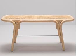 The bench has a narrow silhouette ideal for slim spaces, and can be used as a shoe rack, plant table, coffee table or to display books and records. Rattan Bench Traverse By Orchid Edition Design Ac Al Studio