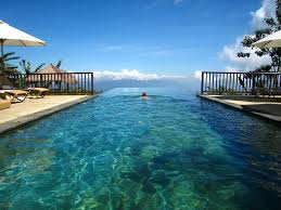 Bali Infinity Pool Swimming To The Edge Of Eternity Infinity Pool Pool Swimming Pools