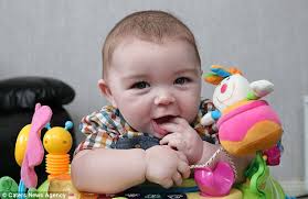 Mother told her unborn twins were just a 'mass of cells gives birth to  miracle baby after medics missed his heartbeat'