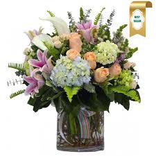 Order bogo red roses flower arrangement from kuhn flowers, your local jacksonville, fl florist. Garden Of Dreams Arranged By A Florist In Jacksonville Fl Kuhn Flowers