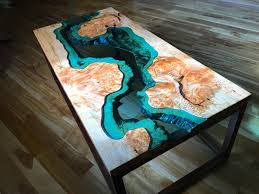 The crashing waves are created using a series of layered resin atop a gorgeous walnut slab of reclaimed. The Big Leaf Maple River Coffee Table Luxury Residence