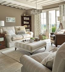 The Calm Cream Decor In This English Cottage Is By Laura Ashley Find More Cottag Laura Ashley Living Room Brown Living Room Decor Furniture Design Living Room