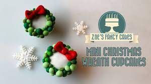 Christmas cake decorations christmas cupcakes fondant flowers sugar flowers poinsettia flower christmas poinsettia biscuit winter treats gum paste flowers. Christmas Wreath Cupcakes Fondant Christmas Wreath Cake Decorating Tutorial Christmas Cupcake Ideas Youtube