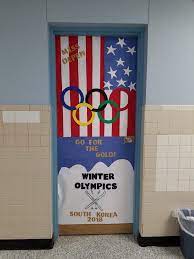 Even if the fire marshal says it's a no go on the classroom door decorations then these can be great inspiration for a bulletin board! Classroom Door Olympics February Winter Sports Teacher Teacher Appreciation Doors Sports Theme Classroom Sports Classroom Decorations