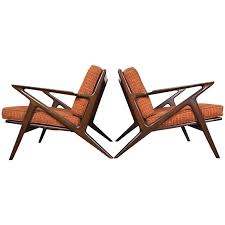 The chairs has been upholster back to their original integrity with high density foam and high grade wool. Danish Modern Z Lounge Chairs By Poul Jensen For Selig At 1stdibs