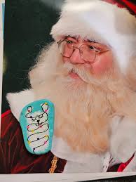 Beautifully painted rock found at Merle Hay Mall