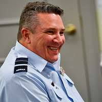 Lt. Col. Robert D. Folker addresses the audience at