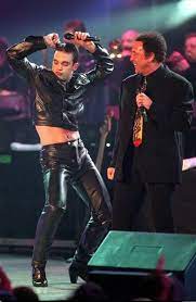 Robbie Williams Photos Photos File The Brit Awards A Look Back Robbie Williams Robbie Tight Leather Pants